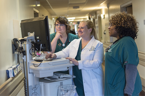 Daisy McQuiston working in hospital with nursing students