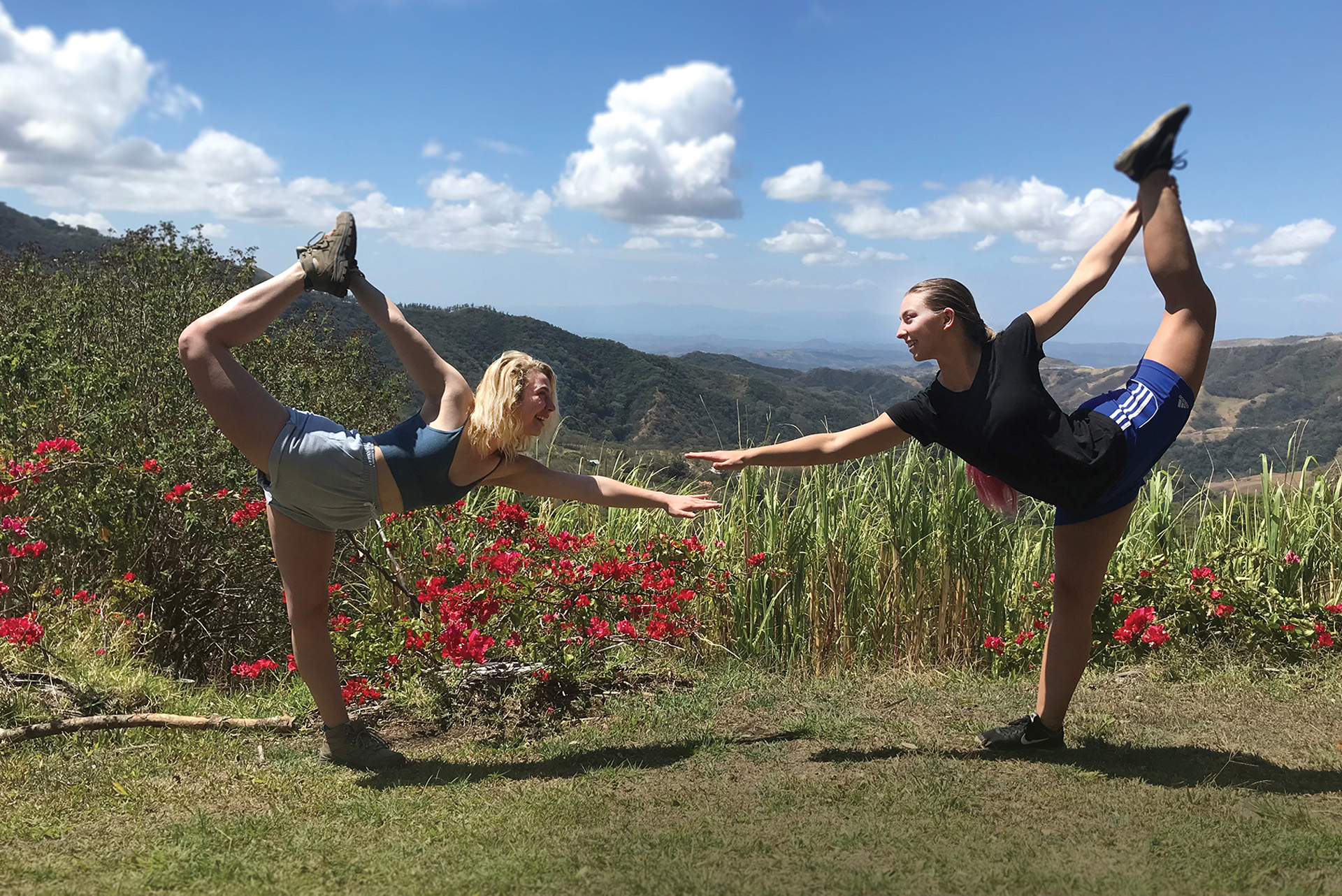 Two students in yoga pose in Costa Rica