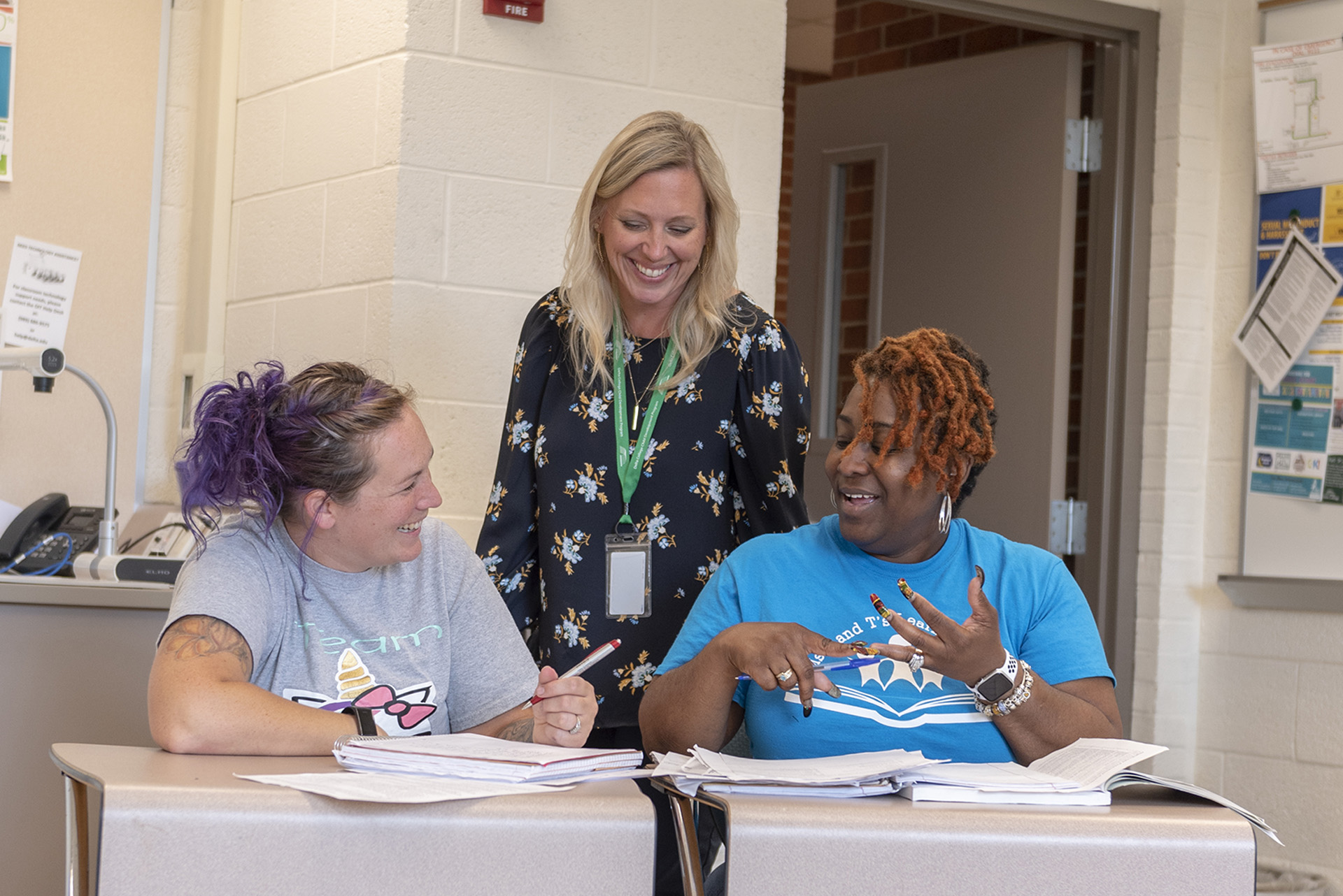 Child Development professor working with students in class.